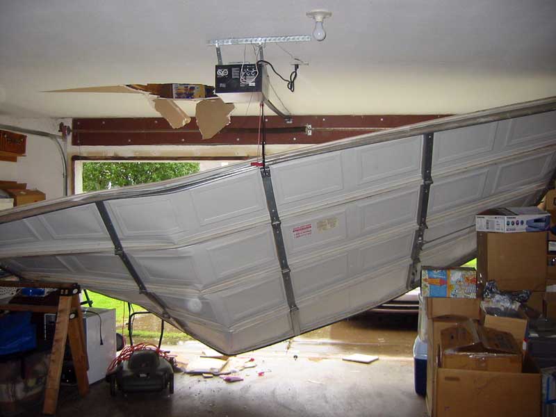 picture Smashed Garage Door garage door accidents why they happen