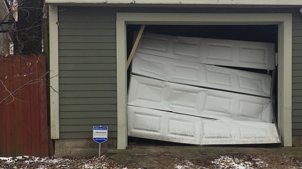 pics Smashed Garage Door garage door smashed in robbery